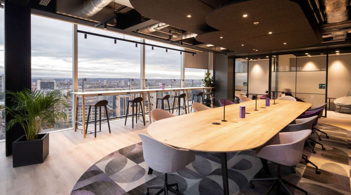 Combining industrial ceiling with modern lighting for business spaces