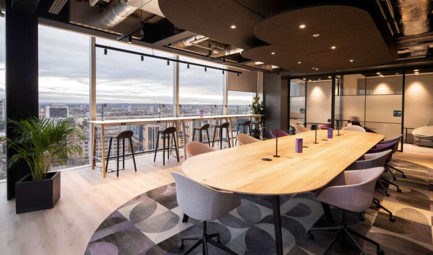 Combining industrial ceiling with modern lighting for business spaces