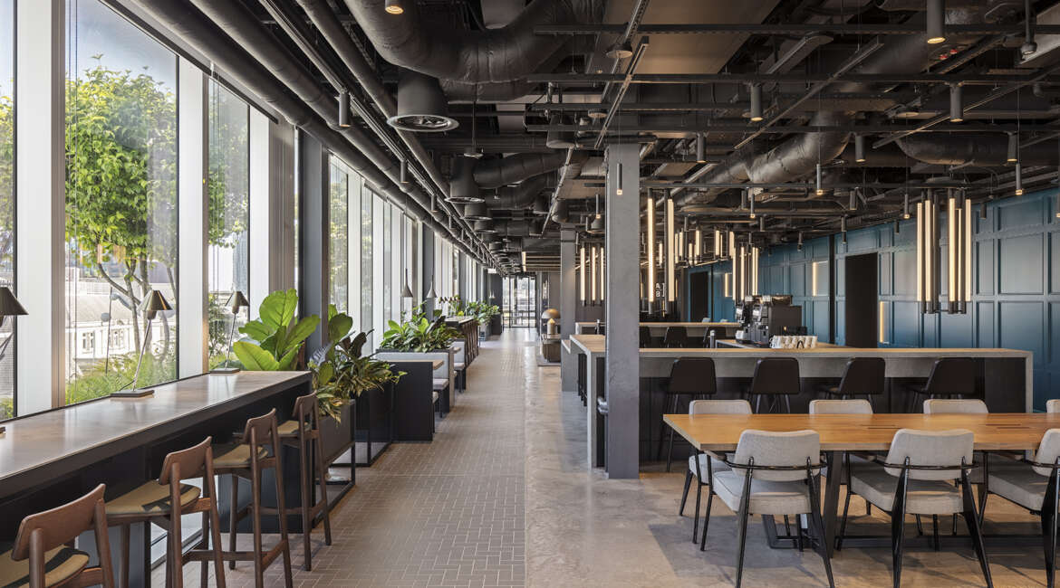 Mix track lighting with industrial ceilings